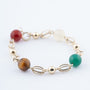 Gouden schakel armband met carneool, wit agaat, groen agaat en tijgeroog