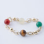 Gouden schakel armband met carneool, wit agaat, groen agaat en tijgeroog