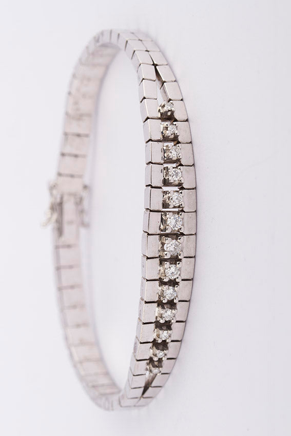 Wit gouden armband met 13 briljanten