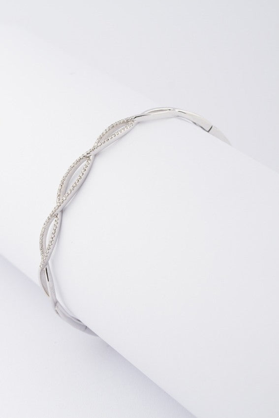 White gold hinged bracelet with diamonds