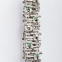 White gold link bracelet with emerald and diamond