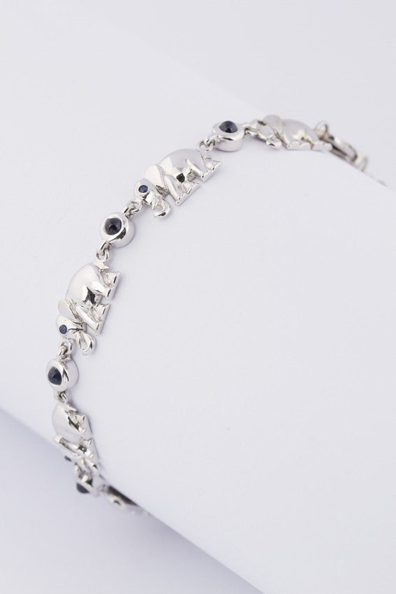 white gold link bracelet with elephants