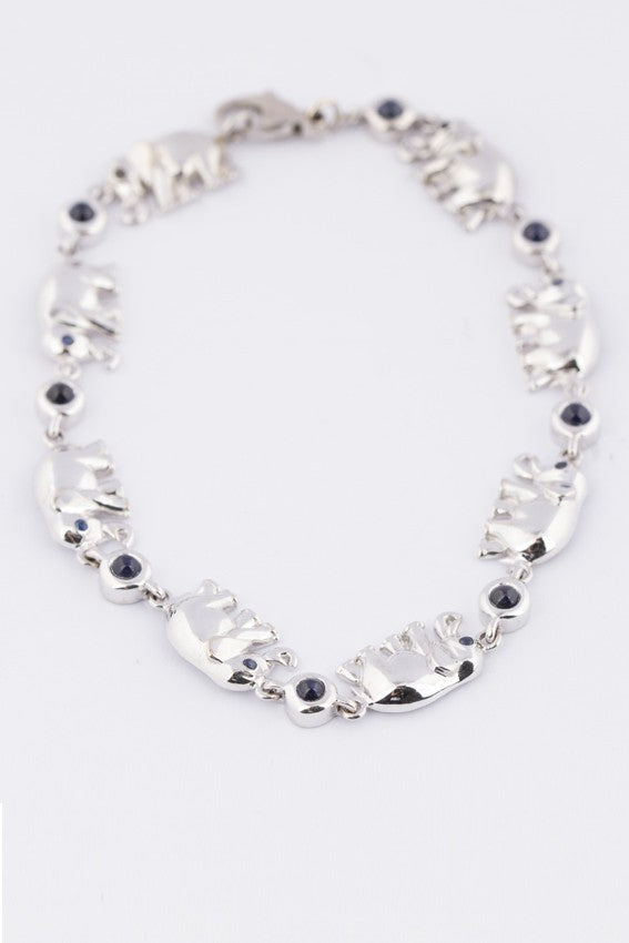 white gold link bracelet with elephants