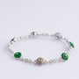 White gold bracelet with jade and diamonds