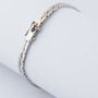Wit gouden armband met saffieren en diamanten