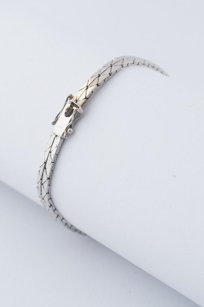 Wit gouden armband met saffieren en diamanten