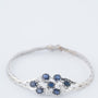 Wit gouden armband met saffieren en diamanten