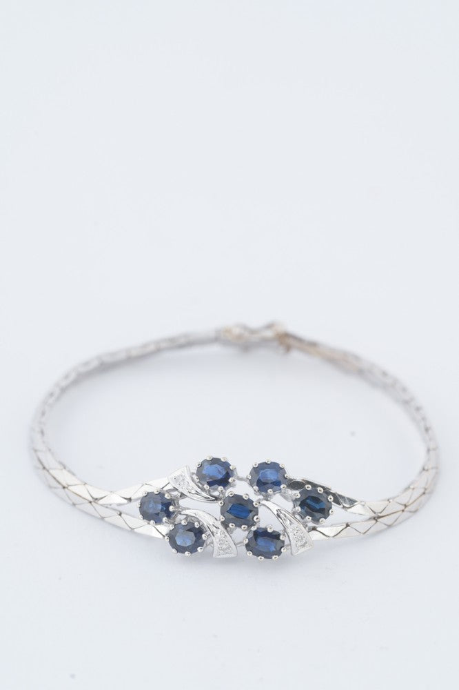 Wit gouden armband met saffieren en diamanten