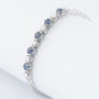 White gold link bracelet with sapphires and diamonds