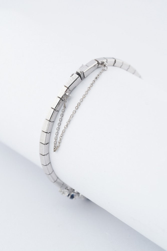 Wit gouden schakel armband met saffieren en briljanten