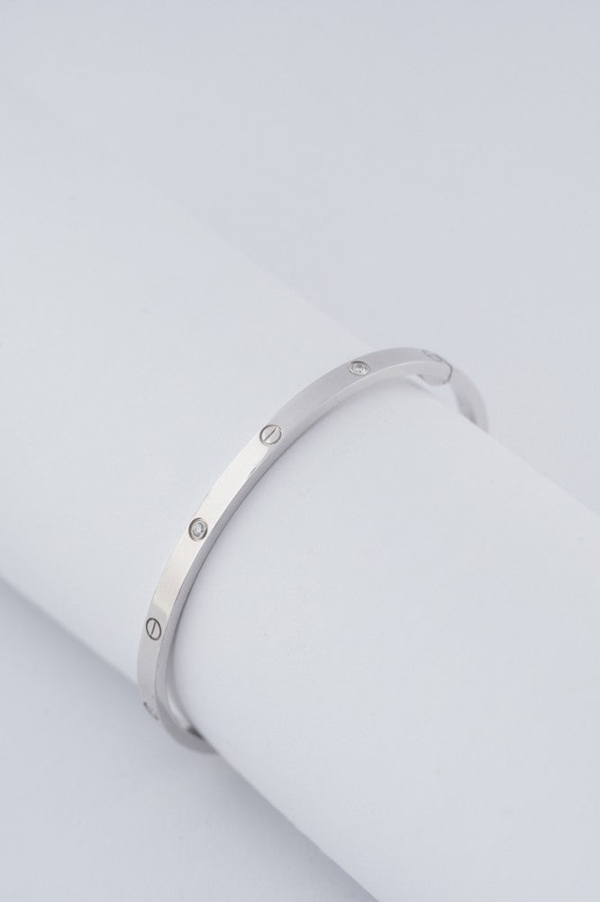 Wit gouden Love Bracelet met briljanten van Cartier