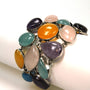Silver link bracelet with various gemstones