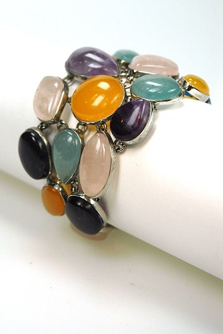 Silver link bracelet with various gemstones