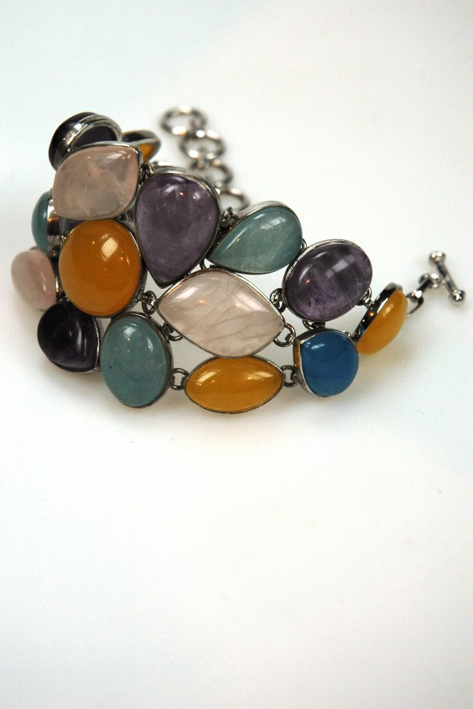 Silver link bracelet with various gemstones