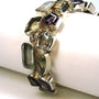 Silver link bracelet with various gemstones
