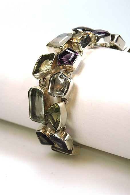 Silver link bracelet with various gemstones