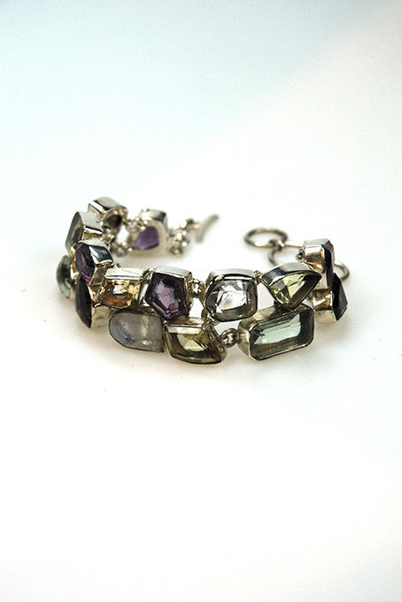 Silver link bracelet with various gemstones