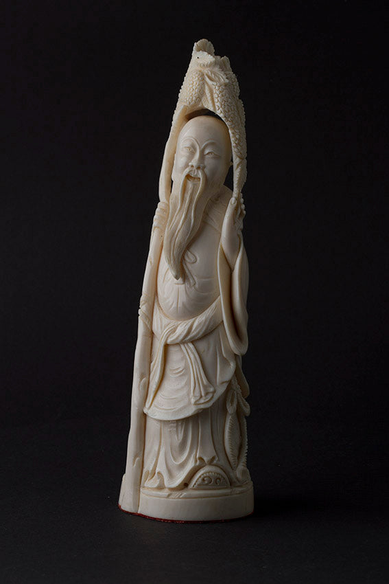 Old ivory sculpture of a philosopher