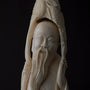 Old ivory sculpture of a philosopher