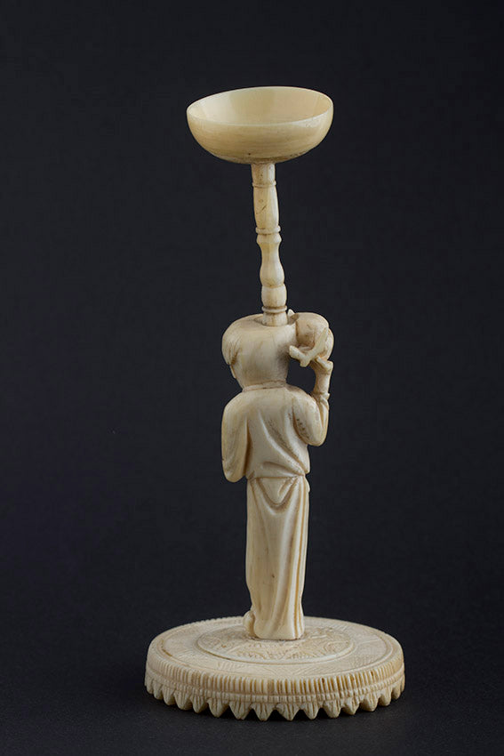 Ivory lucky ball carried by a man