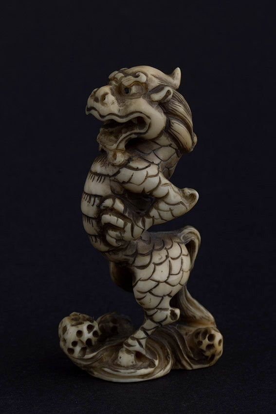 Antique ivory netsuké lion