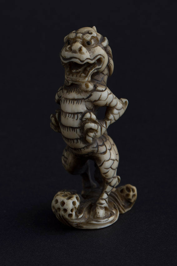 Antique ivory netsuké lion