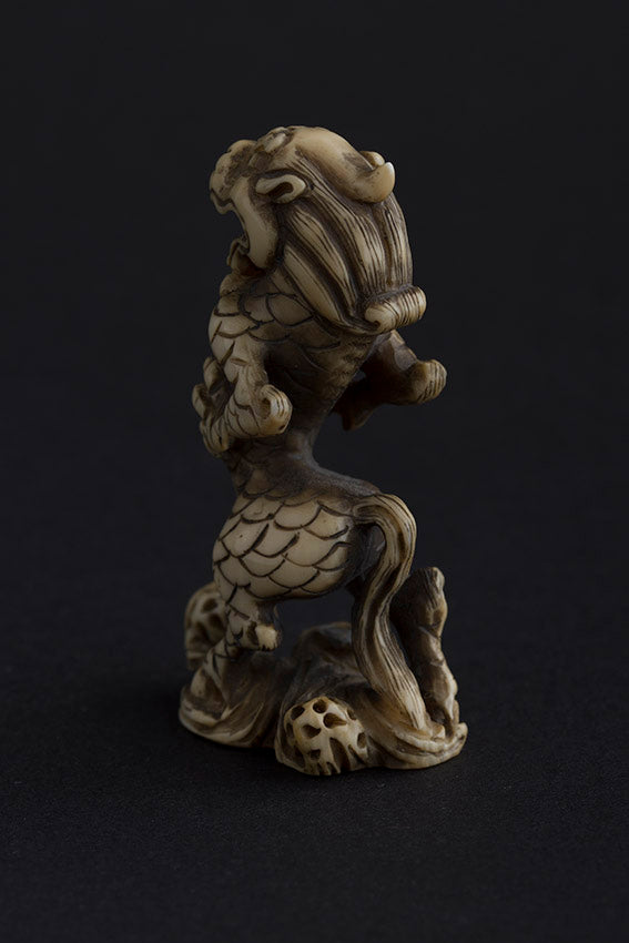 Antique ivory netsuké lion