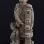 Antique ivory okimono, so-called mask seller