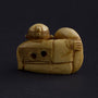 Antique ivory netsuké man with Darma doll