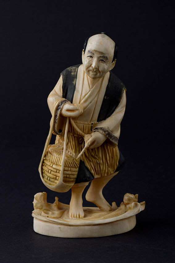 Ivory okimono fisherman