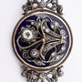 Antique gold brooch with enamel