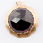 Brooch/pendant with faceted garnet