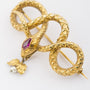 Antiek gouden slangen broche met robijn