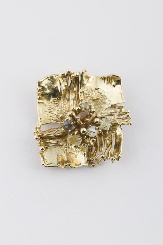 Gouden broche met diamanten