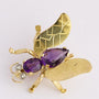 Golden insect brooch with amethyst and diamond