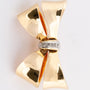 Gold bow brooch with 5 diamonds