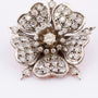 Antieke gouden bloem broche met diamanten
