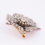 Antieke gouden bloem broche met diamanten