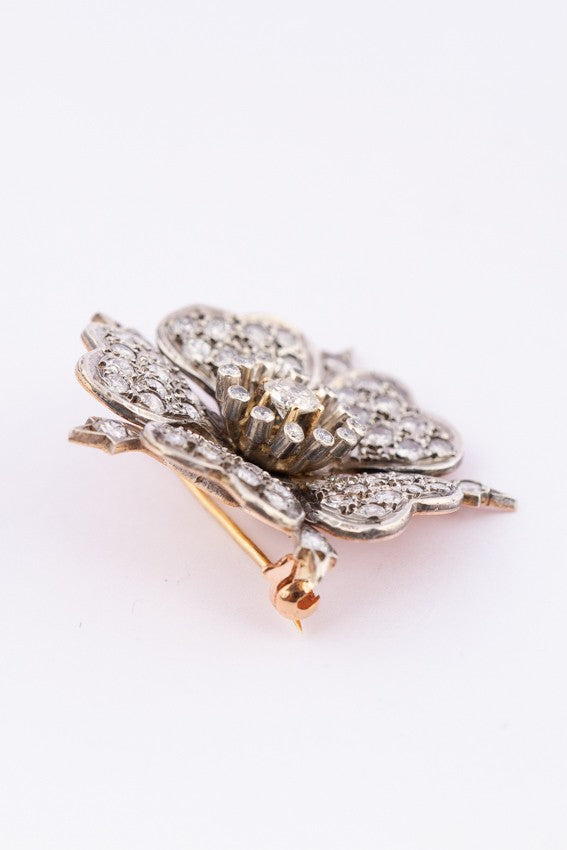 Antieke gouden bloem broche met diamanten