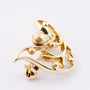Golden bird brooch