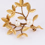 Gold branch brooch with pearls