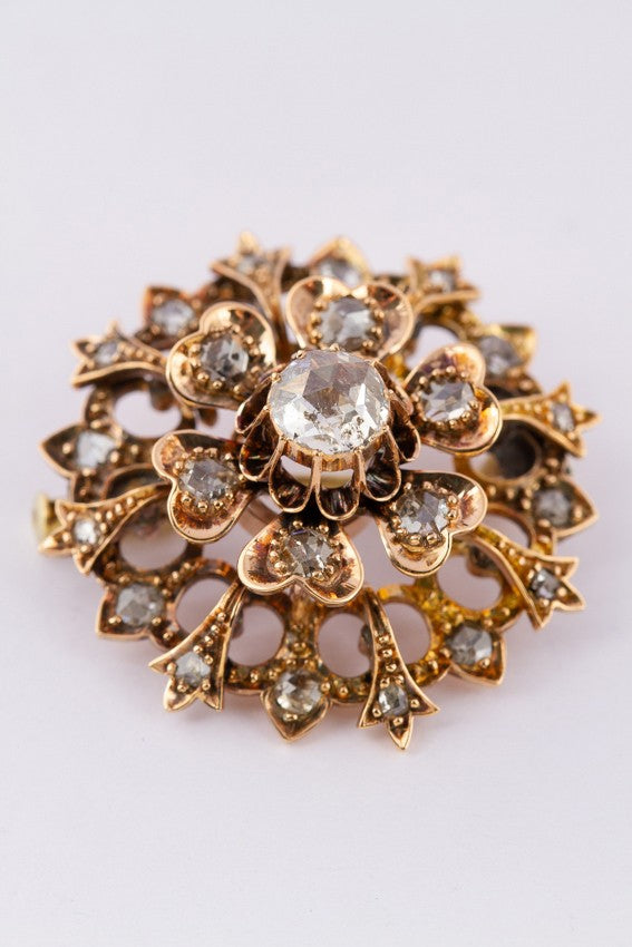 Antique double entourage brooch with diamonds