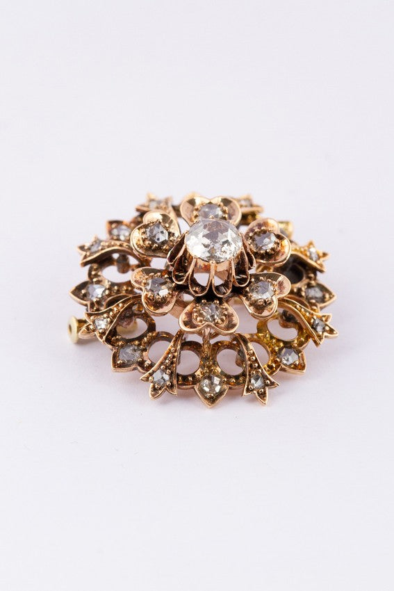 Antique double entourage brooch with diamonds