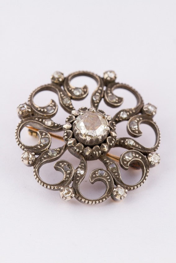 Antique gold brooch with diamonds