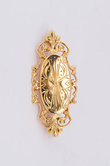 14 carat gold engraved brooch.