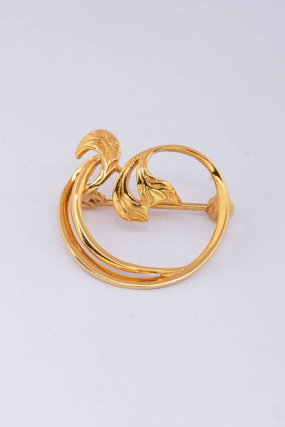 14 carat gold brooch.