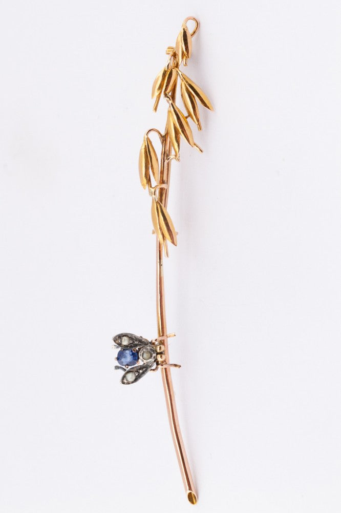 Brochette with sapphire, pearls and diamond
