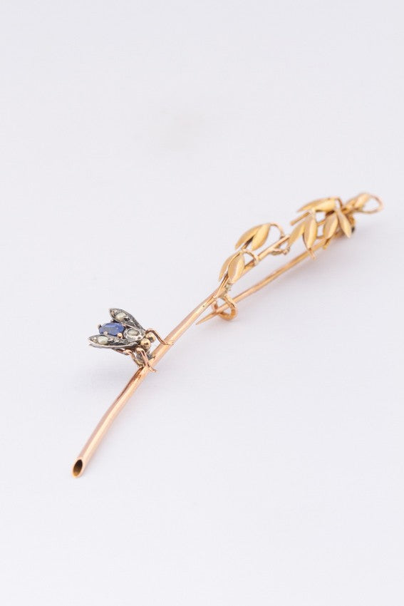 Brochette with sapphire, pearls and diamond
