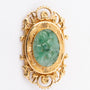 Gold brooch with jade