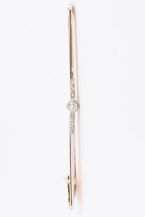 White/yellow gold brooch with a brilliant and rose cut diamond